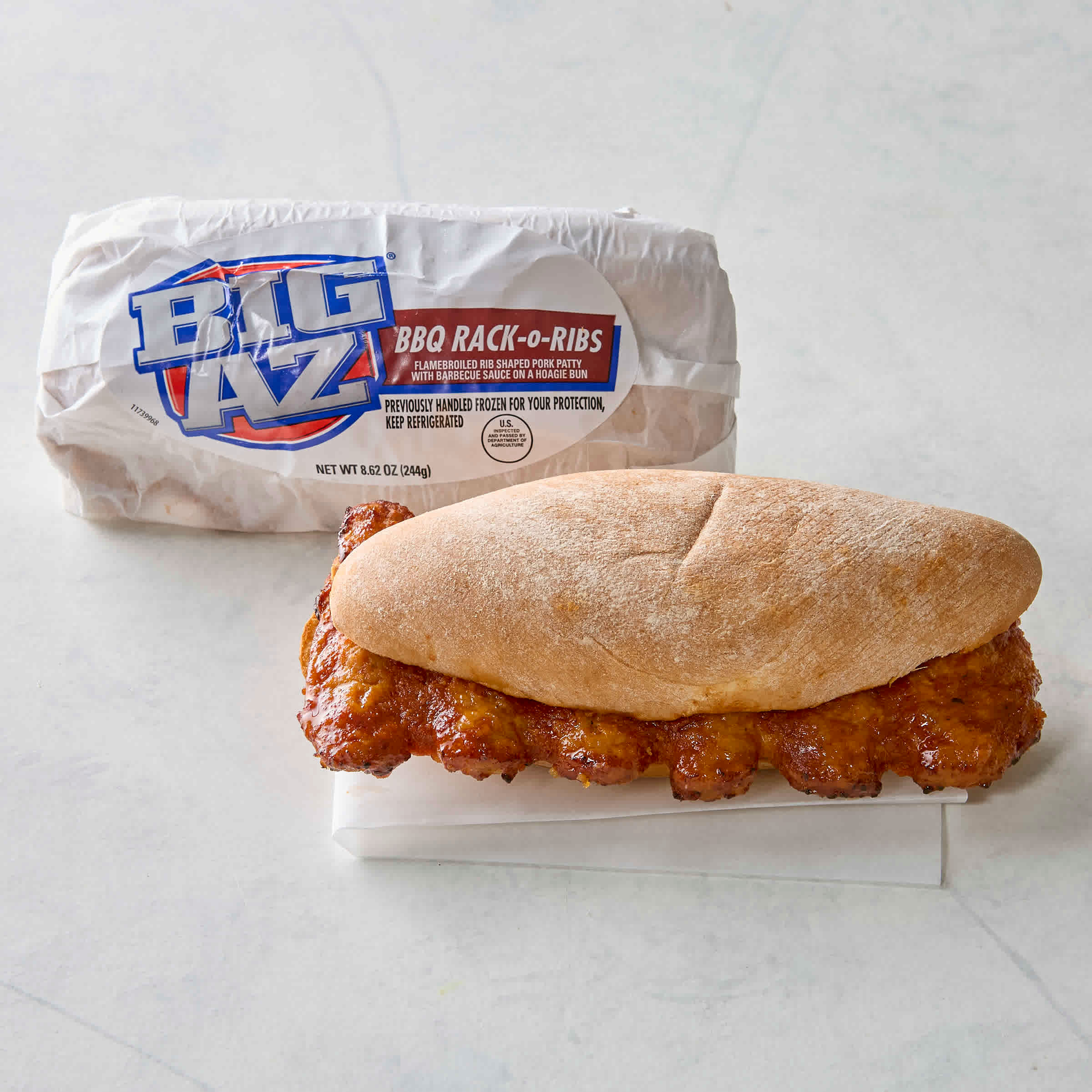 Advance Pierre Big Az Rack Oiled Ribs Barbecue Pork Sandwich, 8.6 Ounce -- 8 per case.